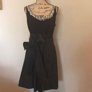 Little black dress with pearl rhinestone neckline